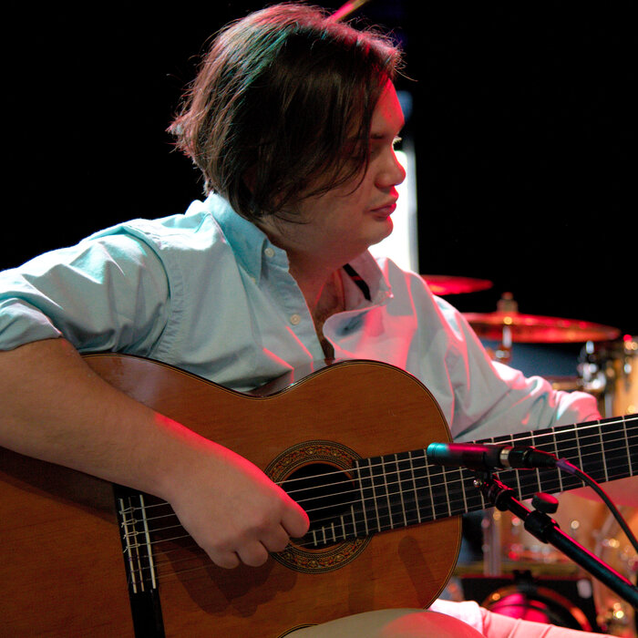 Yamandu Costa on stage at the BFM, Geneva