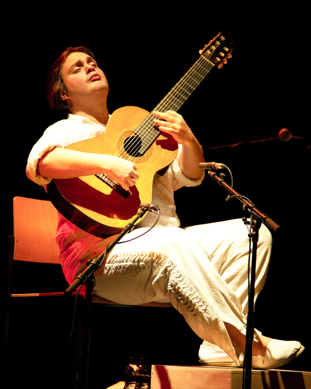 Yamandu Costa playing seven-string guitar at the BFM, Geneva